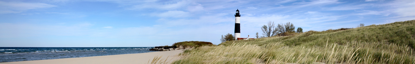 The Lighthouse at Big Sable Point, standing on the windswept shore of Lake Michigan